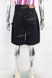 Black patchwork denim shorts