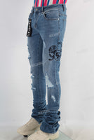 Blue damaged skinny stack jeans