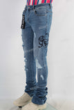 Blue damaged skinny stack jeans