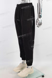 Black skull patch binding feet pants men
