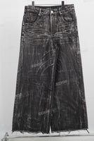 Black baggy acid washed raw hem jeans