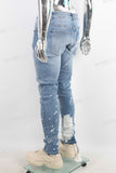 Blue tie dye damaged jeans