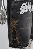 Black embroidered damaged shorts