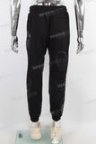 Black skull patch binding feet pants men