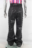 Double layered black waxed flared jeans