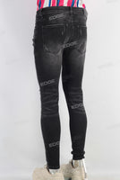 Black damaged skinny jeans