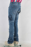 Blue damaged skinny stack jeans