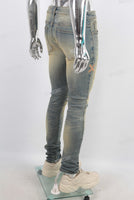 Green vintage damaged skinny jeans