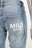Blue tie dye damaged jeans