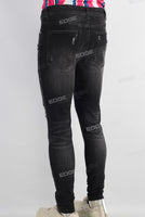 Black damaged skinny jeans