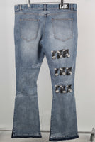 Blue embroidered damaged bell bottom jeans