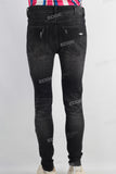 Black damaged skinny jeans