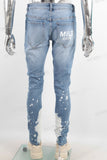 Blue tie dye damaged jeans
