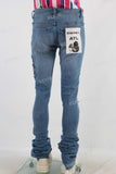 Blue damaged skinny stack jeans
