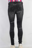 Black damaged skinny jeans