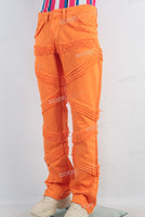 Orange damaged boot cut jeans