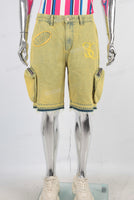 Yellow embroidered boot cut shorts