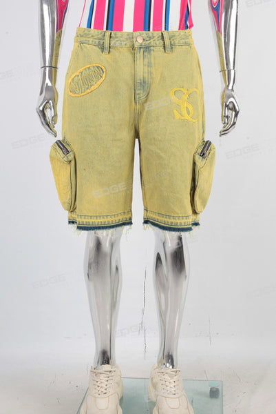 Yellow embroidered boot cut shorts
