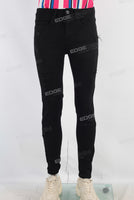 Black skinny damaged denim jeans