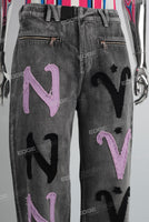 Black acid washed patchwork boot cut jeans