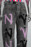 Black acid washed patchwork boot cut jeans