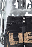 Black screen print jewel on the patch boot cut shorts