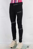 Black skinny damaged denim jeans