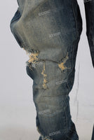 Blue acid washed damaged patchwork rhinestone jeans