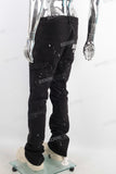 Black paint splatters patchwork jeans