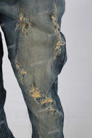 Blue acid washed damaged patchwork rhinestone jeans