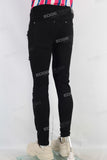 Black skinny damaged denim jeans