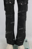 Black patchwork cargo waxed jeans