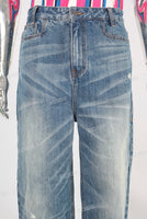 Blue damaged acid washed baggy jeans