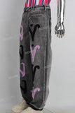Black acid washed patchwork boot cut jeans
