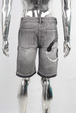 Grey digital print patchwork damaged boot cut jeans