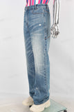 Blue damaged acid washed baggy jeans