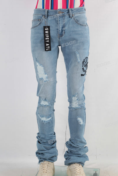 Blue damaged embroidered stack jeans