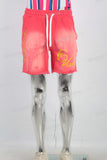 Red acid washed orange digital print boot cut shorts