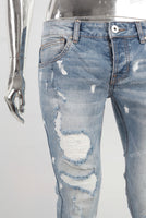 Blue damaged skinny jeans