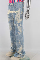 Blue straight damaged screen print jeans