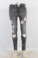 Grey damaged patchwork skinny jeans