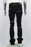 Character embroidered black stacked jeans