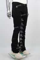 Character embroidered black stacked jeans