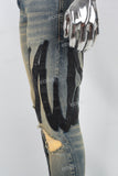 Men's Blue Ripped Jeans with Black Leather Patch