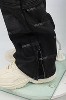 Men's black waxed baggy cargo pants