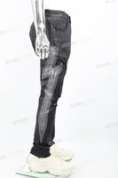 Black waxed and rhinestoned ripped Skinny Jeans