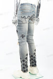 Blue Washed Tattered Embroidered Skinny Jeans