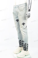 Light blue distressed rewashed tattered embroidered Skinny Jeans