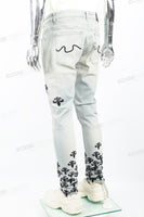 Light blue distressed rewashed tattered embroidered Skinny Jeans