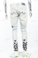 Light blue distressed rewashed tattered embroidered Skinny Jeans